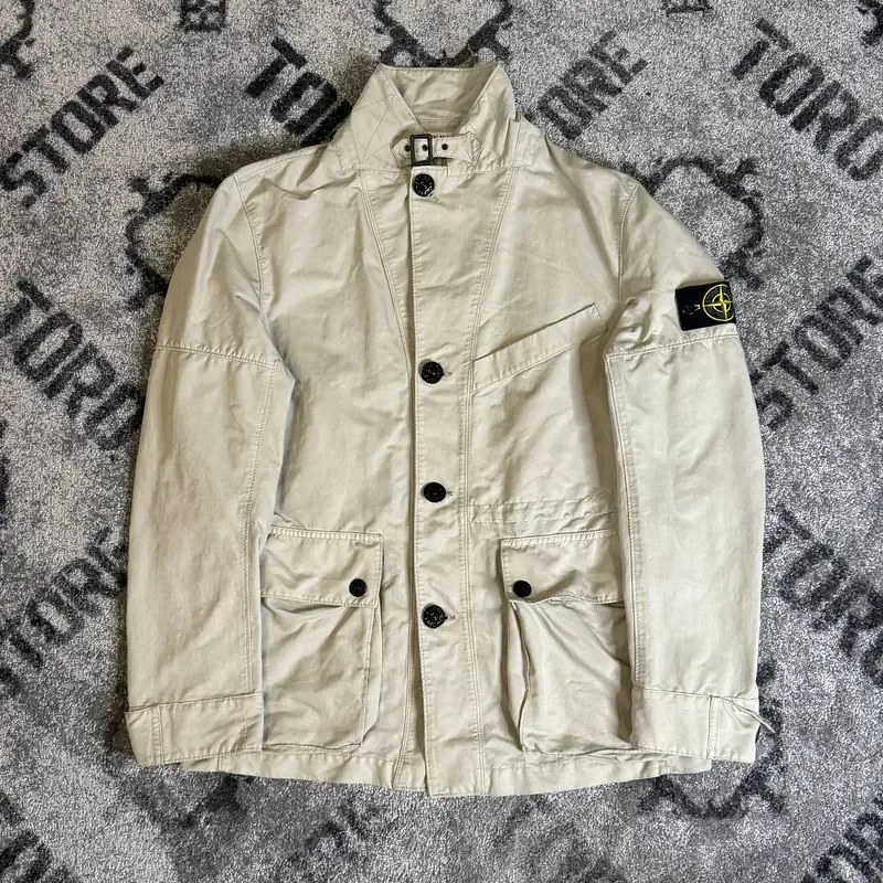 Пальто Stone Island с патчем-компасом